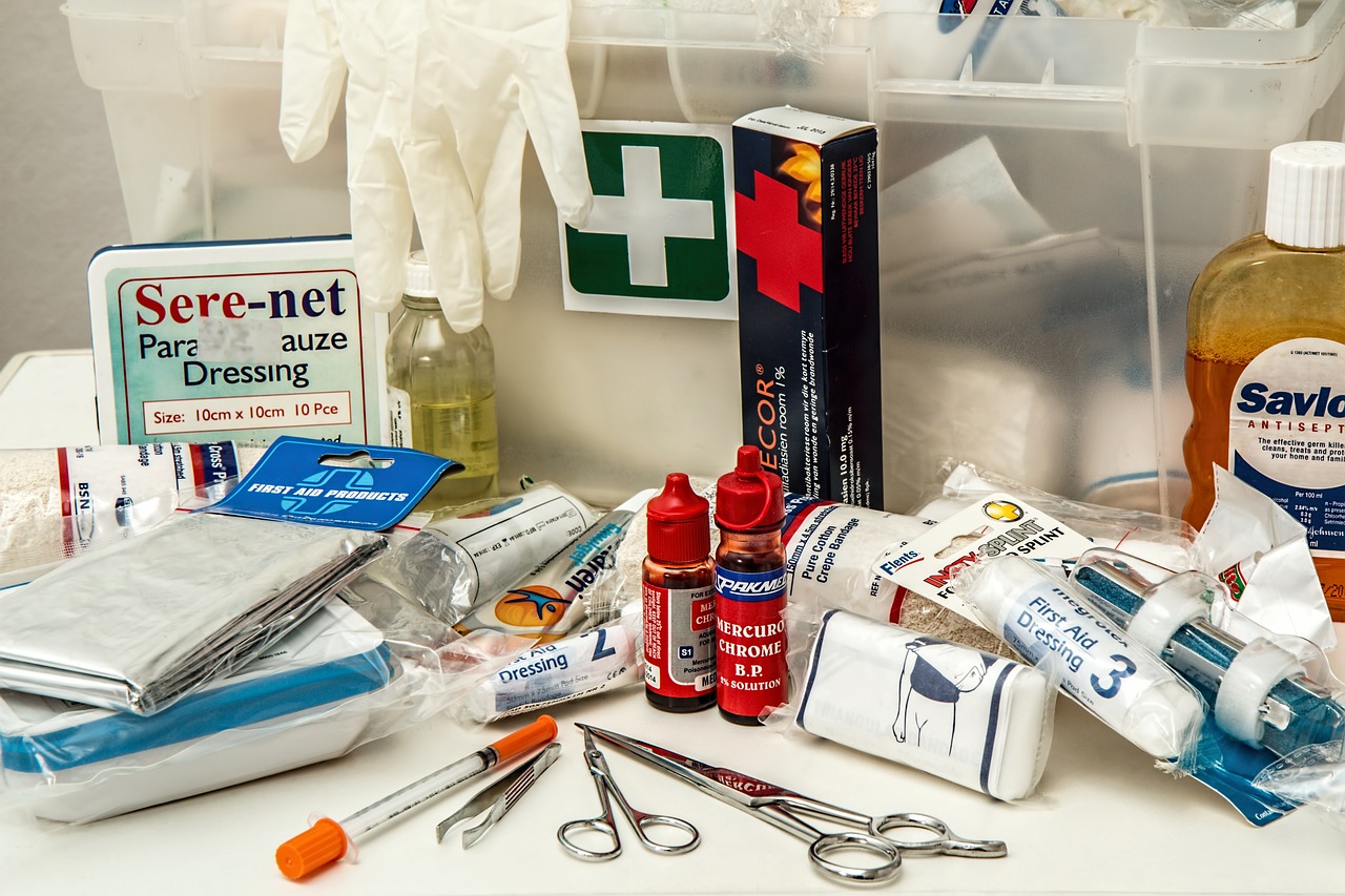 A collection of various first aid items, bandages, wound dressing, antiseptic, etc.